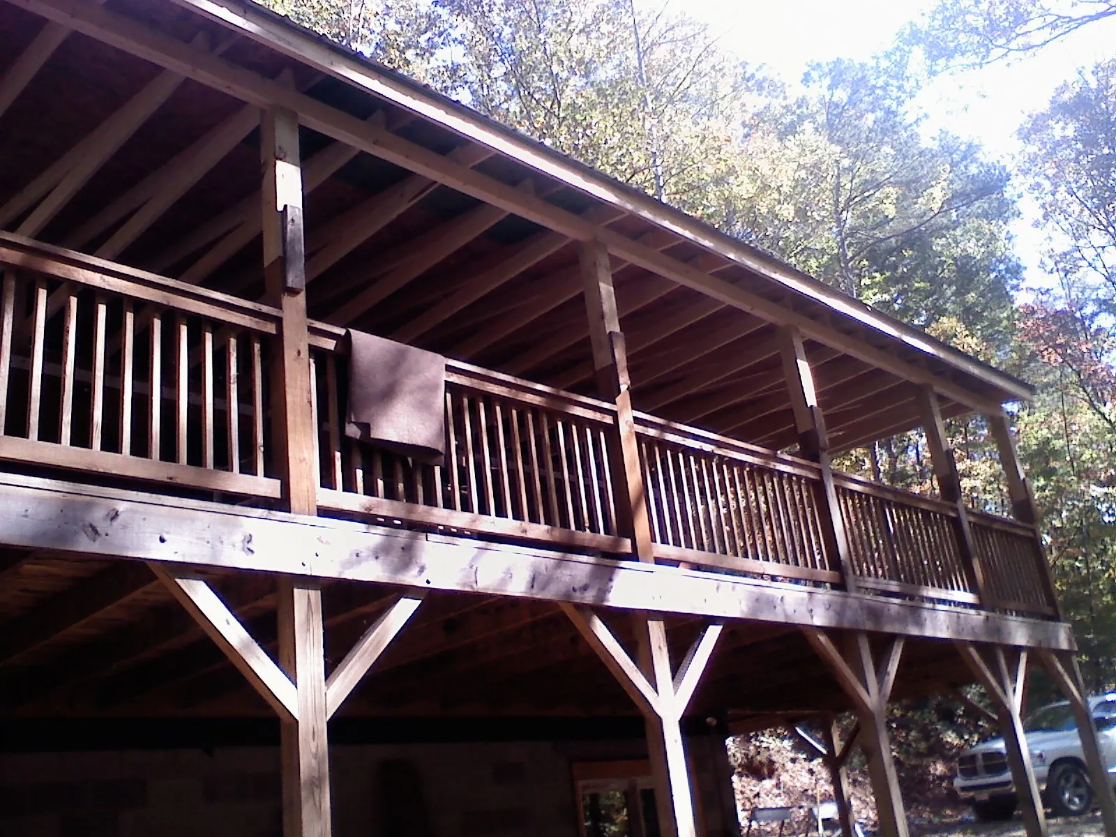 Timber framing under a new elevated porch and deck — Roof Leak Repair in Owings by Roofing Brothers